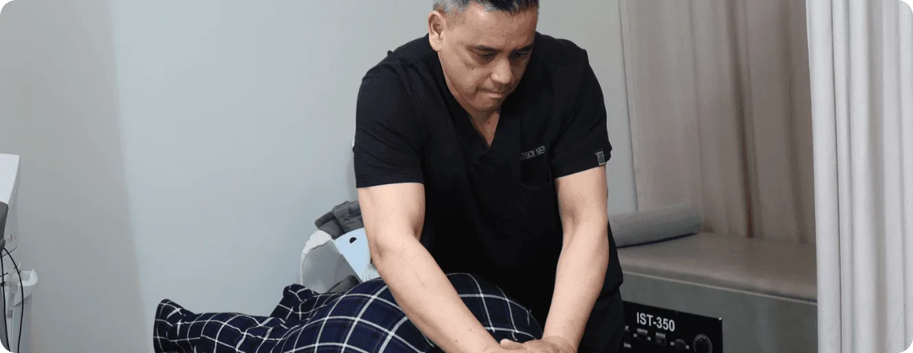 Dr. Nierva with a patient at PPSI